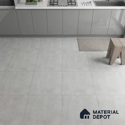 Modern kitchen with grey matte laminate cabinets and light grey stone-look floor tiles