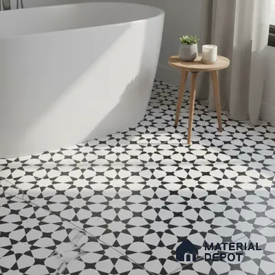 Modern bathroom with black-and-white geometric patterned floor tiles and freestanding tub