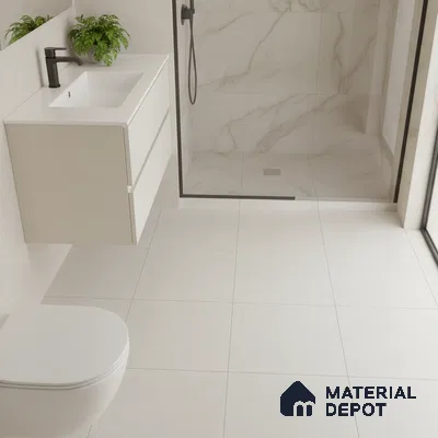 Minimalist bathroom with white matte floor tiles and marble-look wall tiles in shower