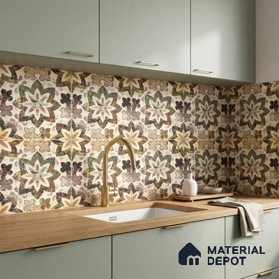 Modern kitchen with sage green laminate cabinets, oak wood countertop, and multicolor floral patterned backsplash tiles