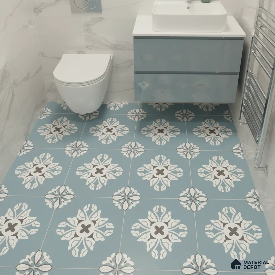 Modern bathroom with blue patterned floor tiles and marble-look wall tiles