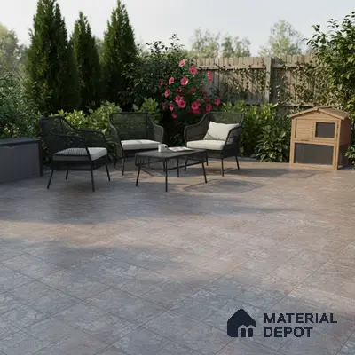 Modern outdoor patio with grey stone-look floor tiles and black wicker furniture