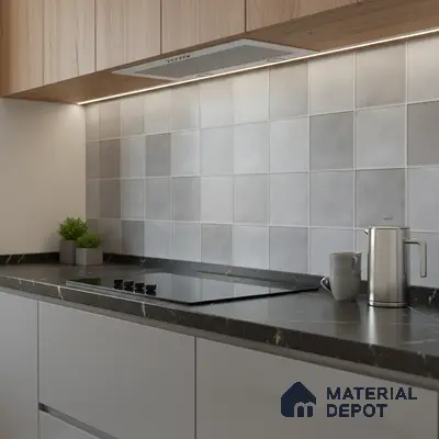 Modern kitchen with light grey square backsplash tiles, black marble countertop, and wood grain laminate cabinets