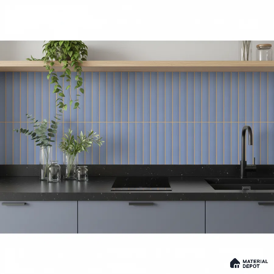 Modern kitchen with pastel blue kitkat backsplash tile, matte black quartz countertop, and blue laminate cabinets