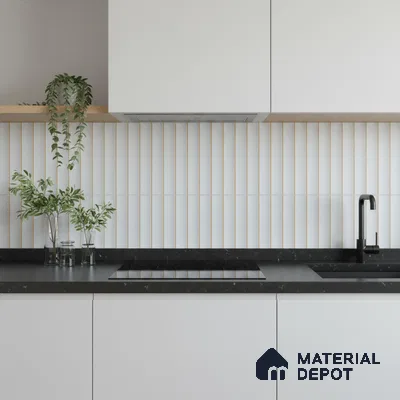 Minimalist kitchen with frosty white laminate cabinets, black quartz countertop, and vertical white kitkat backsplash tiles