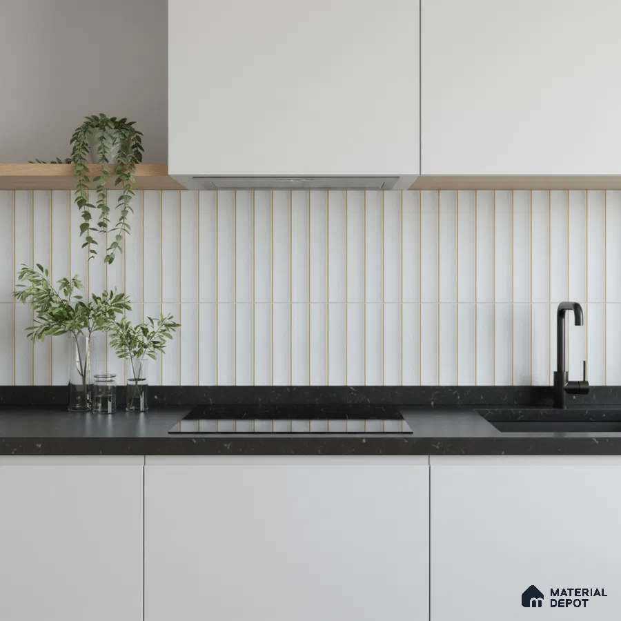 Minimalist kitchen with frosty white laminate cabinets, black quartz countertop, and vertical white kitkat backsplash tiles