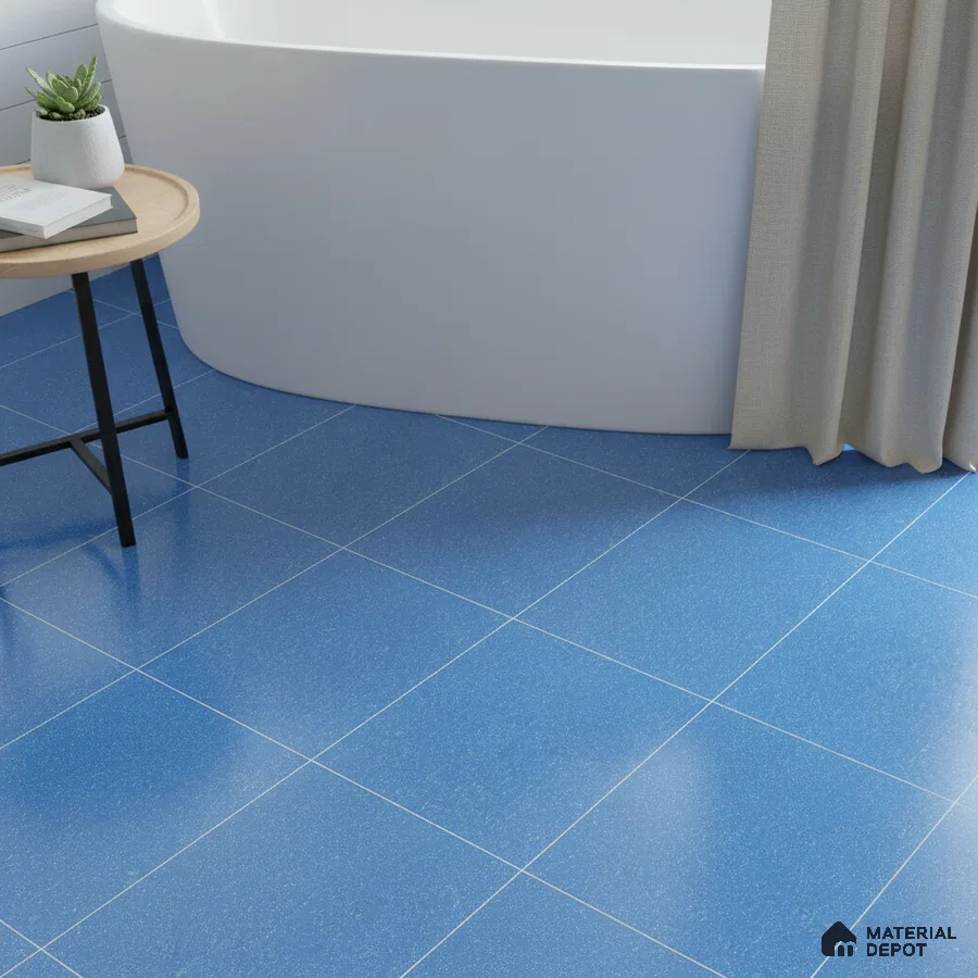 Modern bathroom with blue floor tiles and freestanding tub