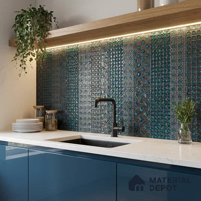 Modern kitchen with blue patterned backsplash tile, white quartz countertop, and glossy blue laminate cabinets