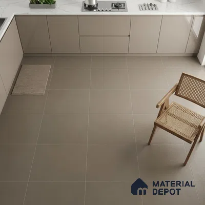 Minimalist kitchen with taupe matte laminate cabinets, white marble-look quartz countertop, and large format taupe floor tiles