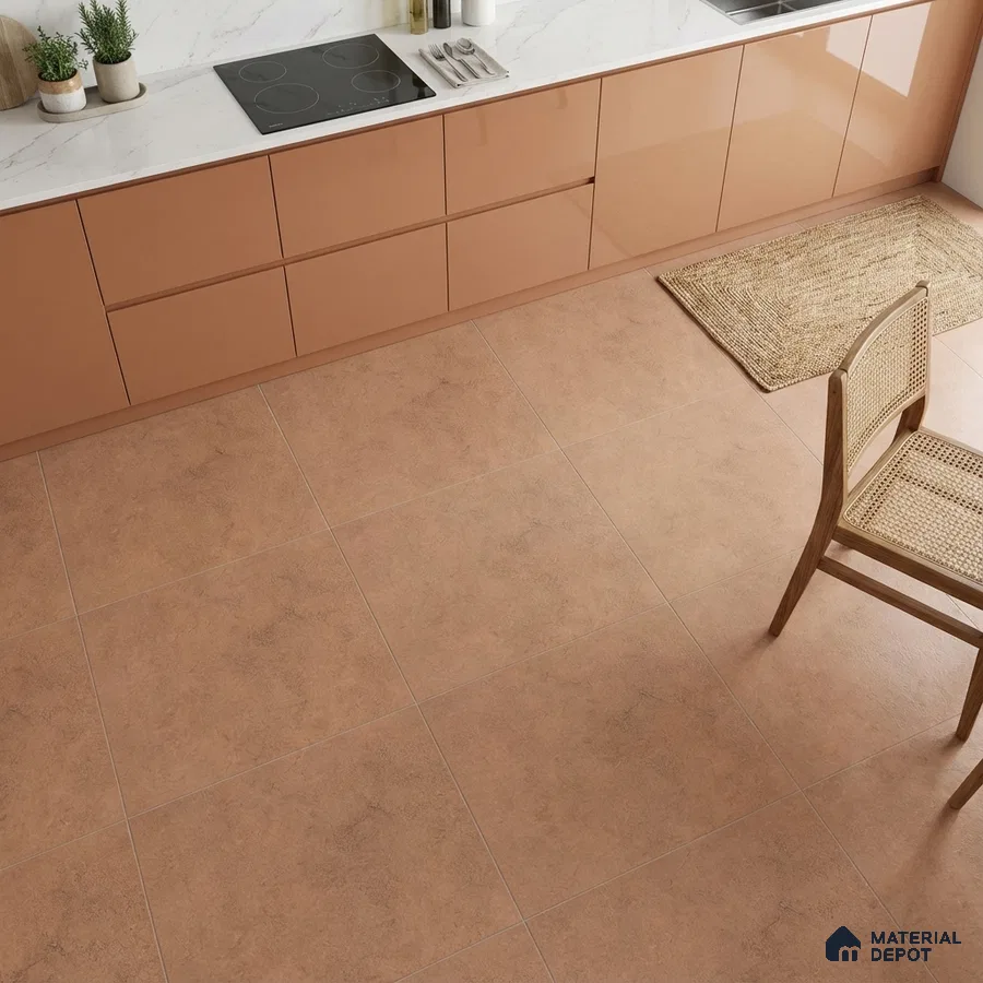 Modern kitchen with terracotta matte floor tiles and glossy peach laminate cabinets