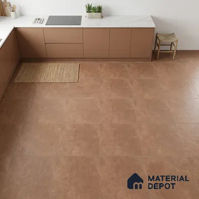 Modern kitchen with matte brown laminate cabinets, white marble-look countertop, and terracotta stone floor tiles