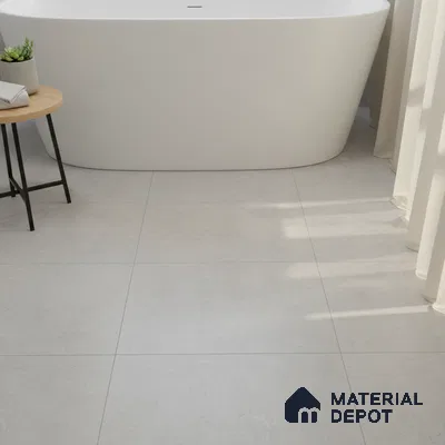 Minimalist bathroom with matte white bathtub and light grey stone-look floor tiles
