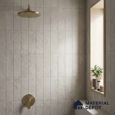 Minimalist Bathroom with Greige Stone-Look Tile and Brass Shower