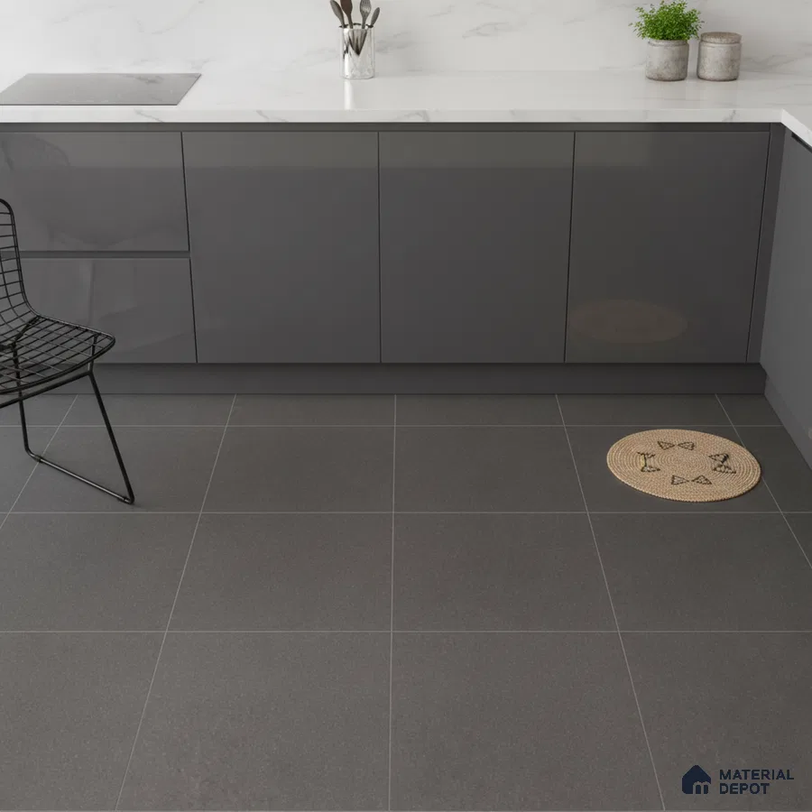 Modern kitchen with grey high gloss laminate cabinets, white marble-look quartz countertop, and charcoal grey floor tiles