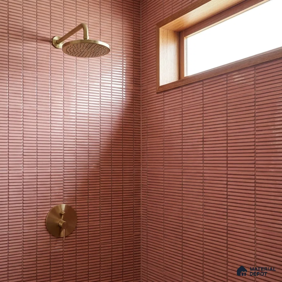 Modern Bathroom with Glossy Terracotta Rose Stacked Kitkat Shower Tile and Brass Fixtures