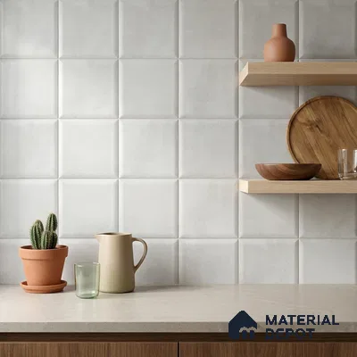 Minimalist Kitchen with White Textured Square Backsplash Tile and Light Oak Shelves