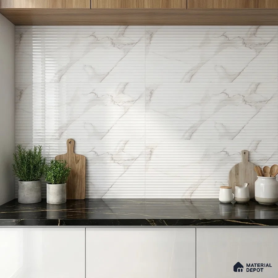 Modern kitchen with ribbed marble-look wall tiles, black marble countertop, and white laminate cabinets