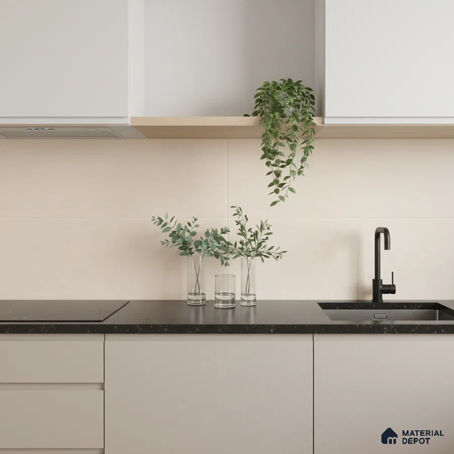 Minimalist kitchen with matte white laminate cabinets, black quartz countertop, and beige wall tiles