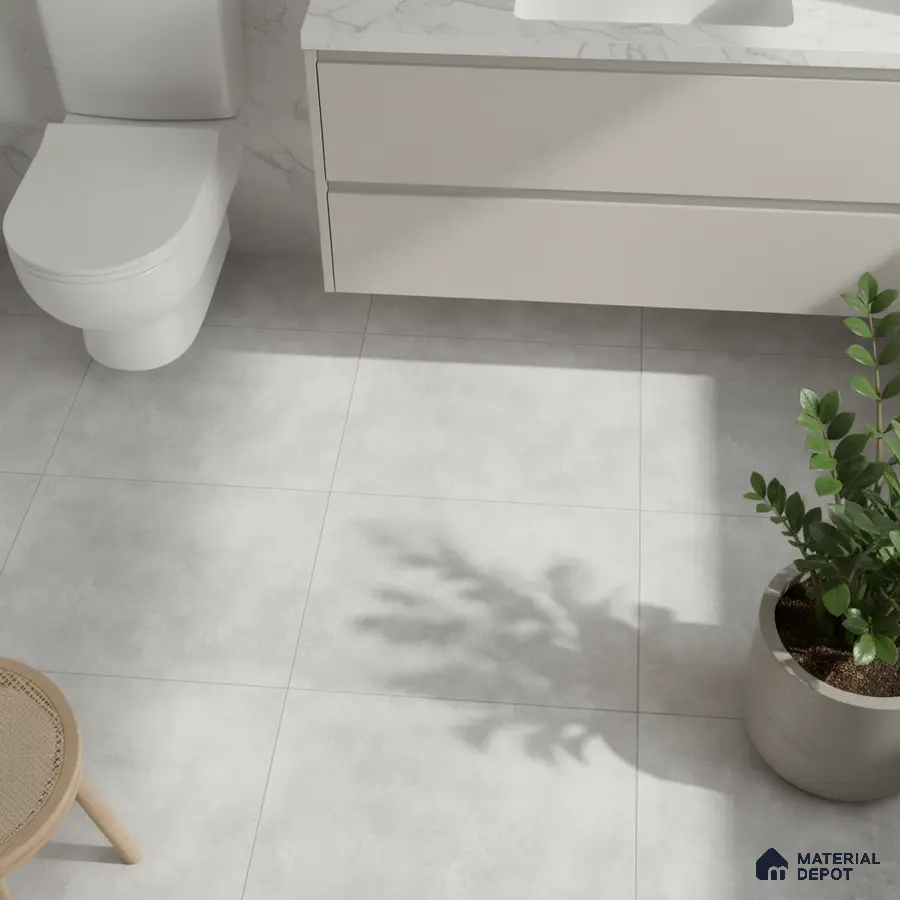 Minimalist bathroom with matte white vanity, marble-look countertop, and light grey floor tiles