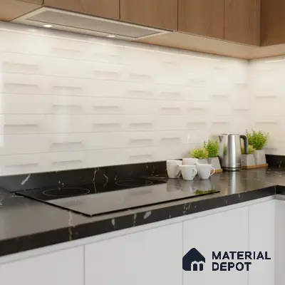 Modern kitchen with white 3D geometric backsplash tile, black marble countertop, and wood laminate upper cabinets