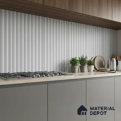 Modern kitchen with taupe quartz countertop, grey matte laminate cabinets, and vertical striped backsplash tile