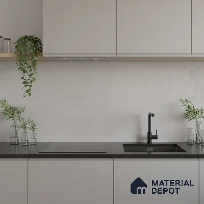 Minimalist kitchen with frosty white laminate cabinets, black quartz countertop, and light grey stone backsplash tile