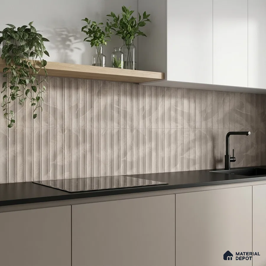 Minimalist kitchen with beige fluted patterned backsplash tile and matte black countertop