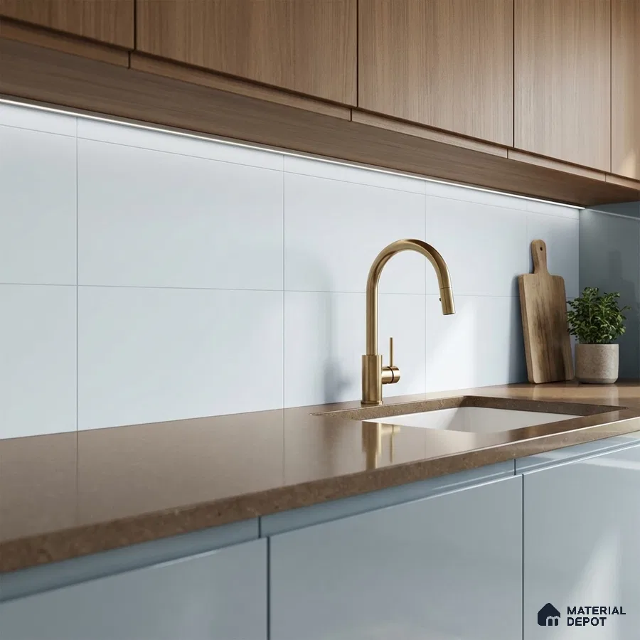 Modern kitchen with light wood laminate cabinets, brown quartz countertop, and frosty white backsplash tile
