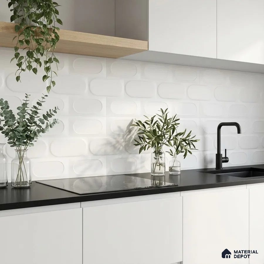 Minimalist kitchen with matte white laminate cabinets, black quartz countertop, and 3D white geometric backsplash tile