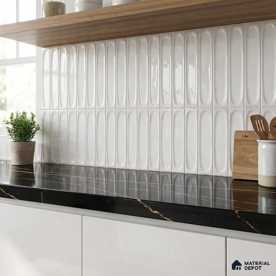 Modern kitchen with white elongated 3D wall tiles, black marble countertop, and white cabinets