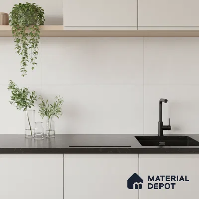 Minimalist kitchen with frosty white laminate cabinets and matte black quartz countertop