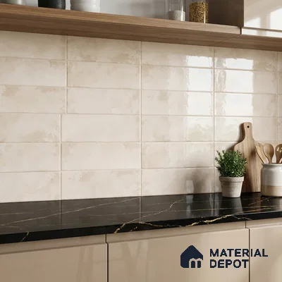 Modern kitchen with beige subway wall tiles, black marble countertop, and taupe laminate cabinets