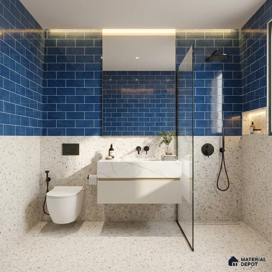 Modern bathroom with blue subway wall tiles and terrazzo floor and wall tiles
