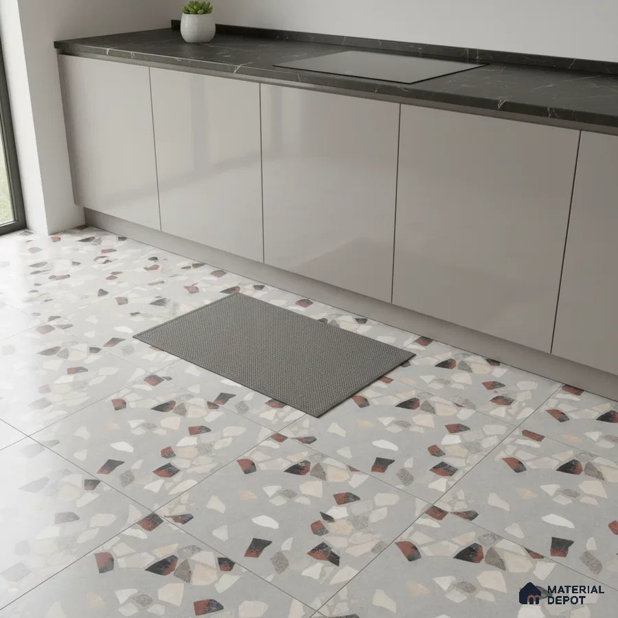 Modern kitchen with glossy beige laminate cabinets, black marble countertop, and terrazzo floor tiles