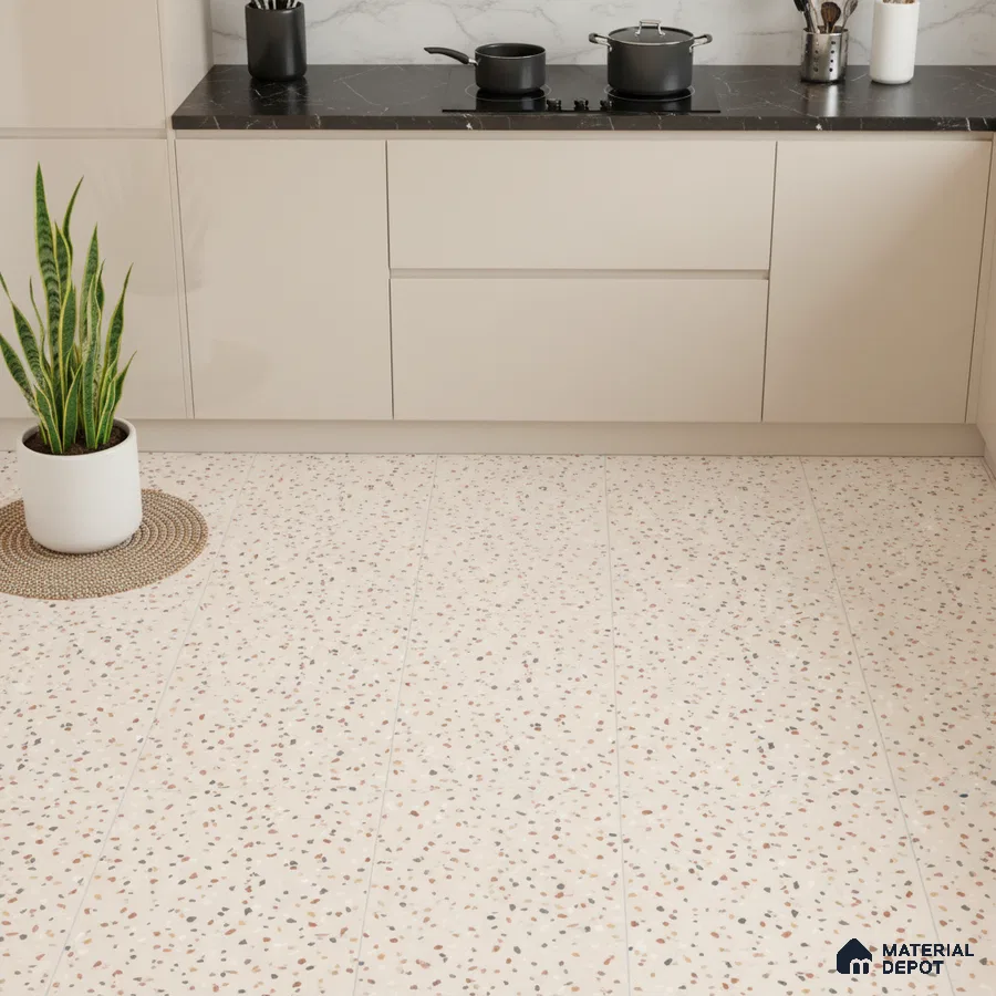 Modern kitchen with beige laminate cabinets, black marble countertop, and terrazzo floor tiles