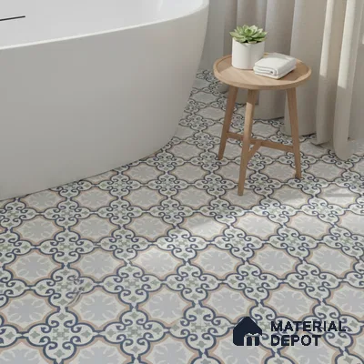 Modern bathroom with blue and green moroccan patterned floor tiles and freestanding tub