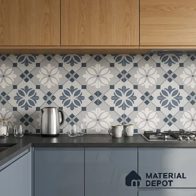 Modern kitchen with blue floral patterned backsplash tile, grey quartz countertop, and oak wood laminate cabinets