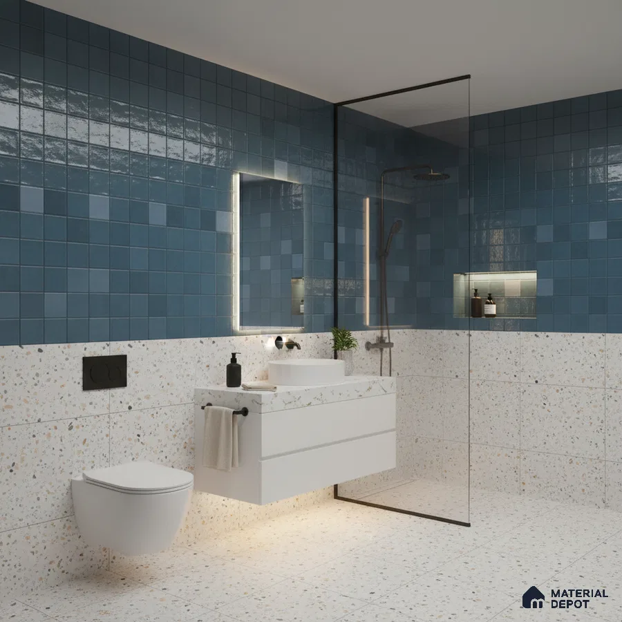 Modern kitchen with blue square wall tiles, black marble countertop, and blue laminate cabinets