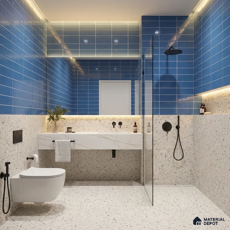 Modern kitchen with blue subway backsplash tile, blue laminate cabinets, and black marble countertop