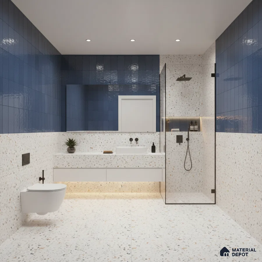 Modern kitchen with blue vertical subway backsplash tile, blue laminate cabinets, and black marble countertop