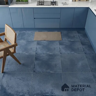 Modern kitchen with blue high gloss laminate cabinets and blue stone-look floor tiles