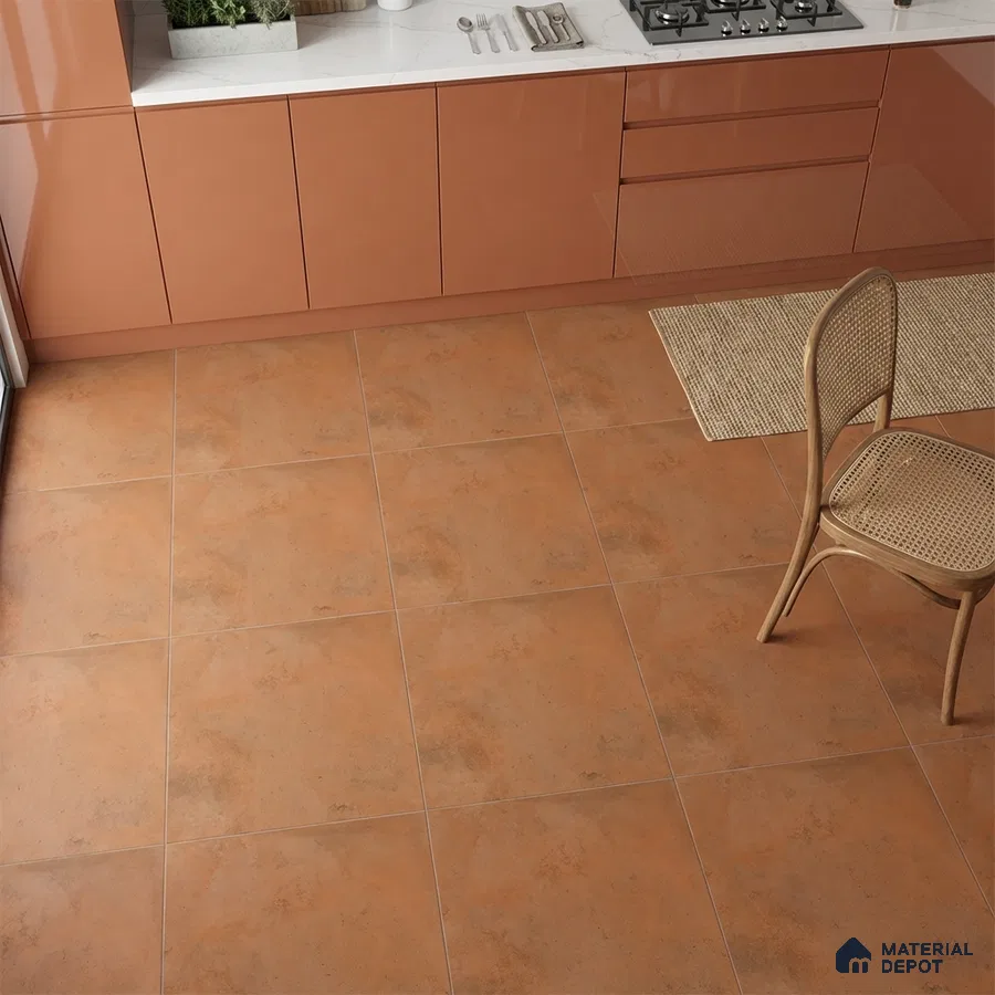 Modern kitchen with terracotta laminate cabinets and terracotta stone-look floor tiles