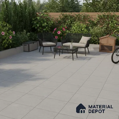 Modern outdoor patio with light grey matte floor tiles and black rope furniture