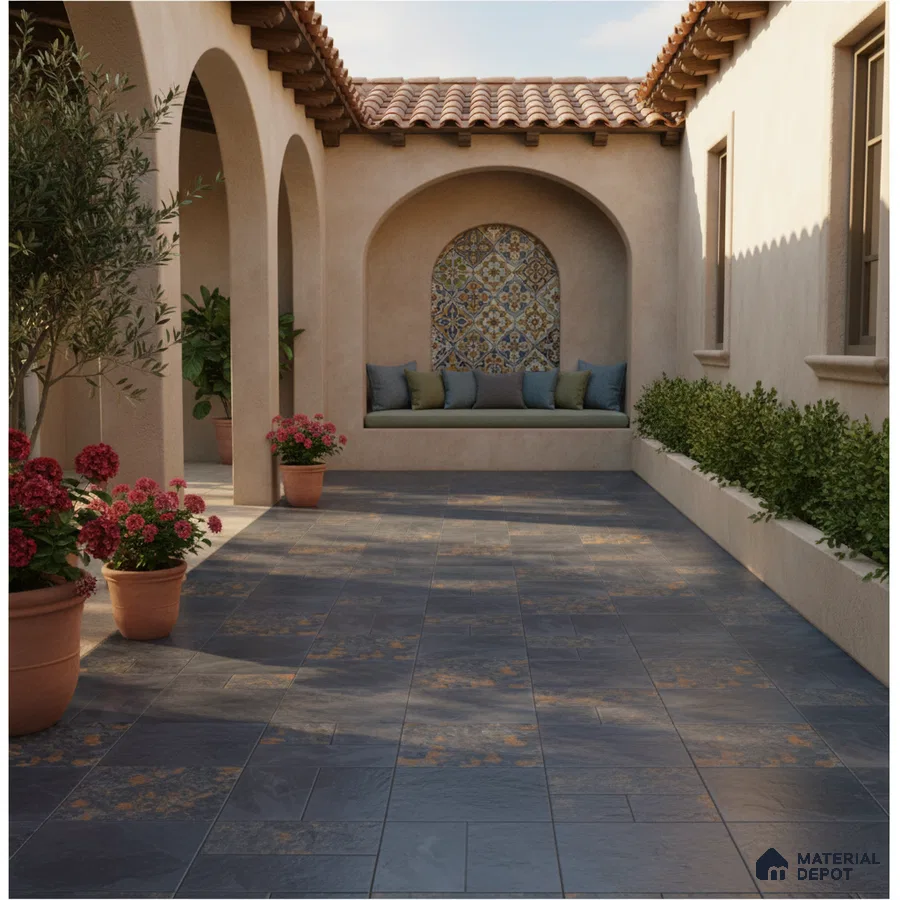 Mediterranean outdoor courtyard with blue slate floor tiles and patterned moroccan accent wall tile