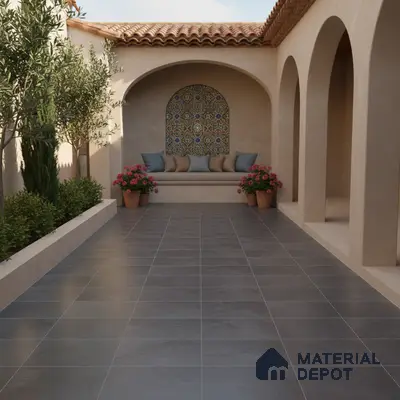 Mediterranean outdoor courtyard with terracotta roof, patterned mosaic wall tile, and grey stone floor tiles