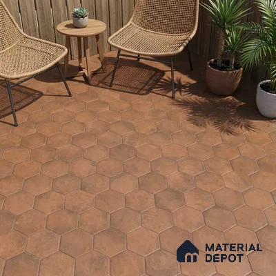 Modern outdoor space with terracotta hexagonal floor tiles and rattan furniture