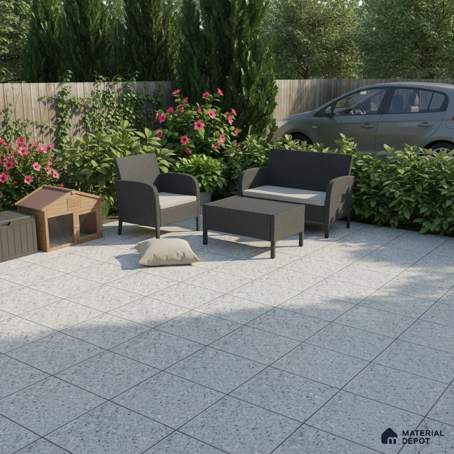 Modern outdoor patio with grey terrazzo floor tiles and rattan furniture
