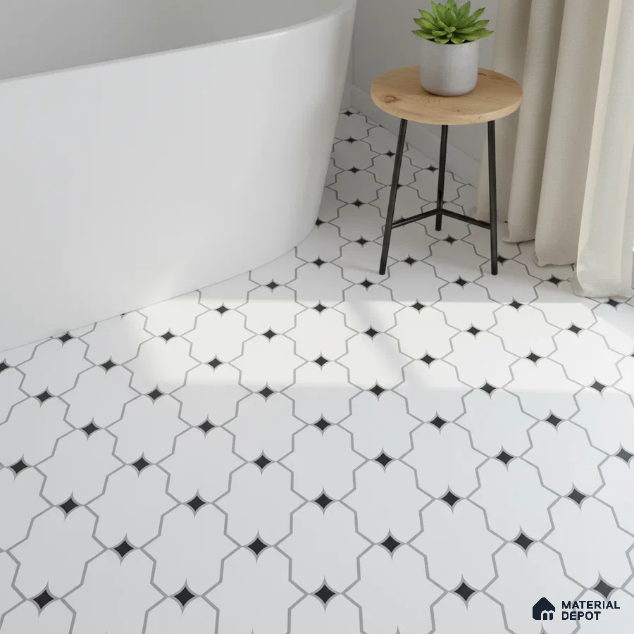 Minimalist bathroom with white geometric floor tiles and freestanding tub