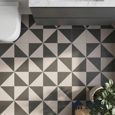 Modern bathroom with geometric black and beige floor tiles and marble countertop vanity