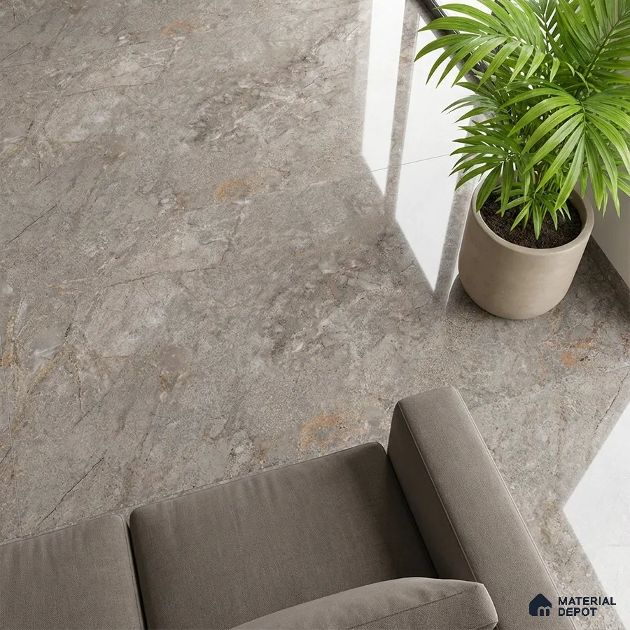 Modern living room with grey marble-look floor tiles and taupe fabric sofa